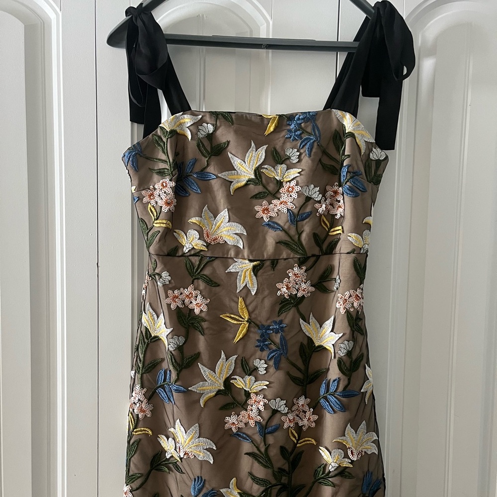 Short fitted Black dress with floral sequins embroidery design